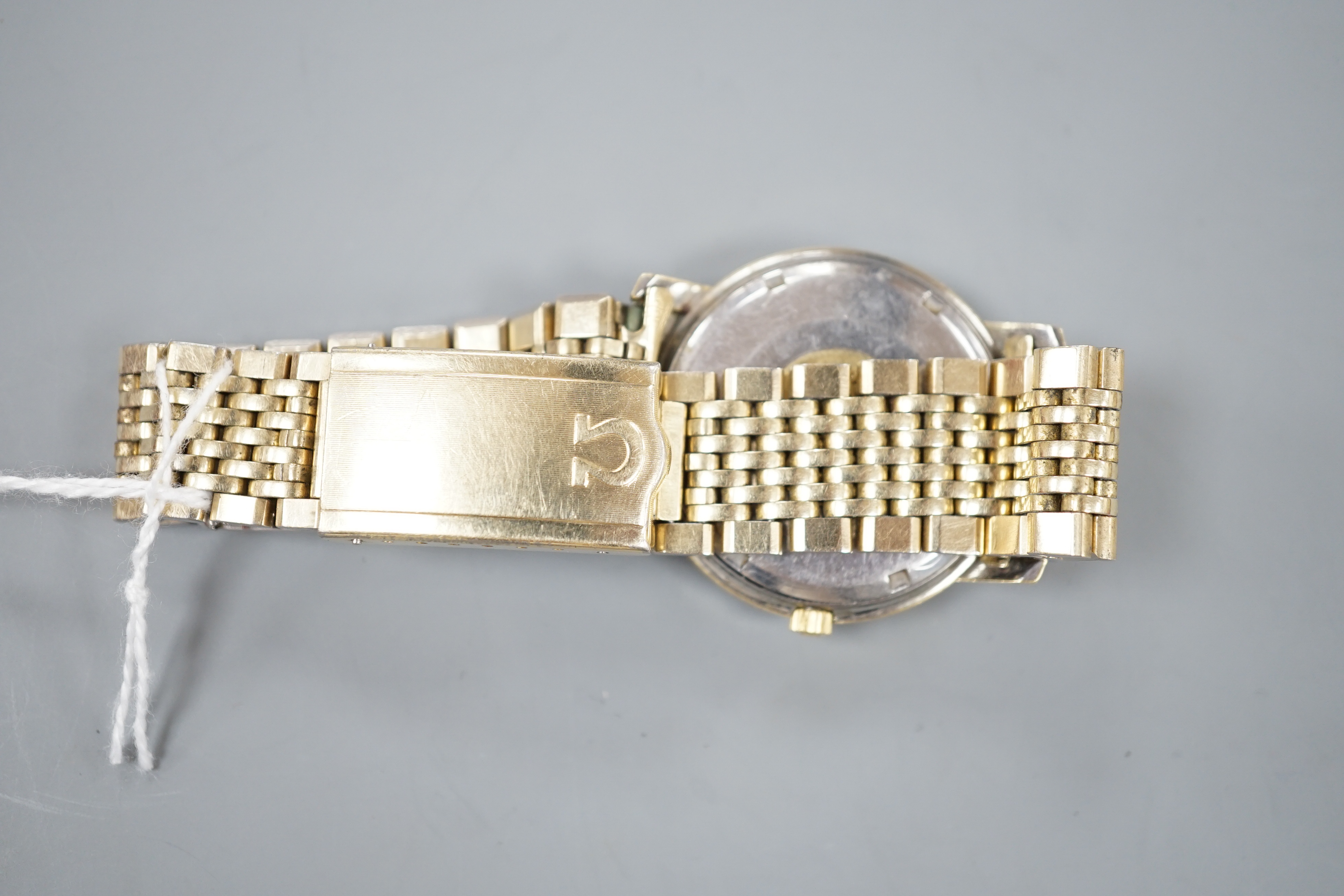 A gentleman's steel and gold plated Omega constellation automatic wrist watch, on an Omega gold plated bracelet.